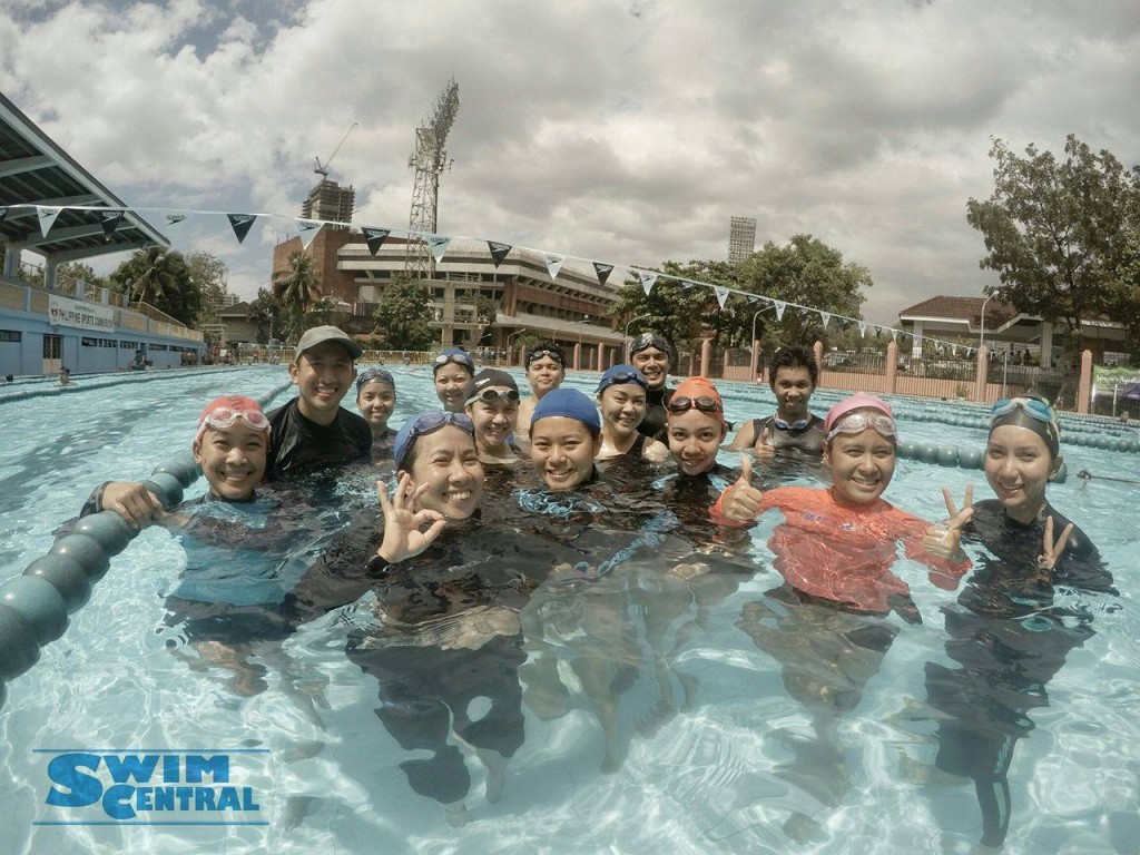 Swim Central Students with Coach Mark